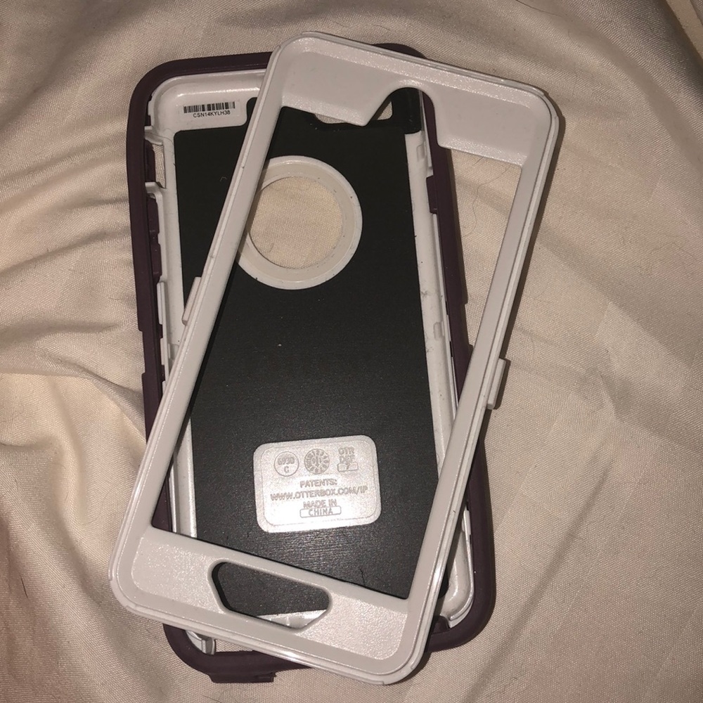 Purple Otterbox case, used less than 10 days total